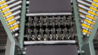 Belted pivot wheel sortation conveyors by Hytrol
