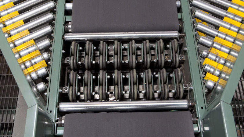 Belted pivot wheel sortation conveyors by Hytrol