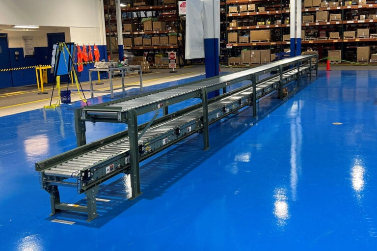 Hytrol Over-Under Live Roller Conveyor for Assembly Line Manufacturing