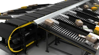 Interroll Vertical Crossbelt Sorter, Small Wheel Conveyor